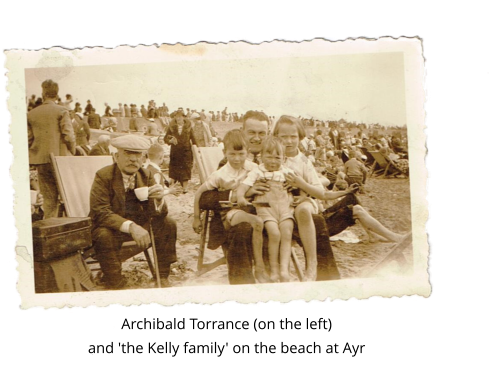 Archibald Torrance (on the left) and 'the Kelly family' on the beach at Ayr
